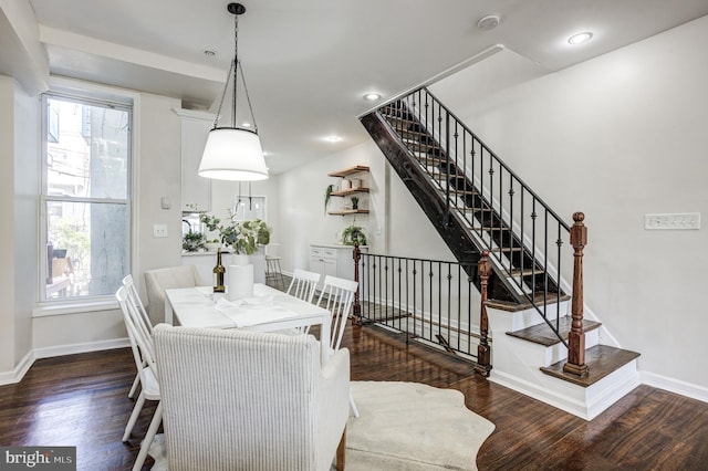 dining room with dark wood-type flooring