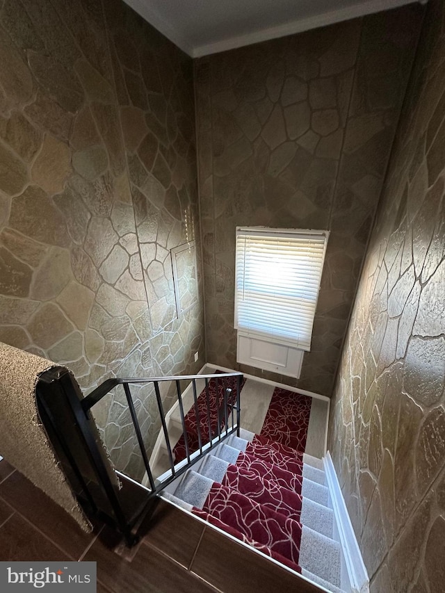 stairway featuring hardwood / wood-style flooring