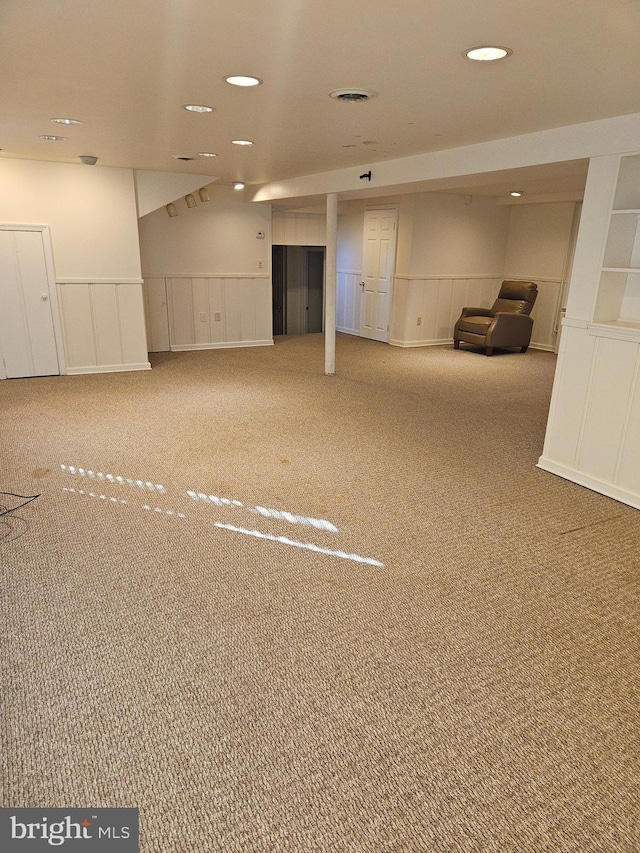 basement with carpet floors