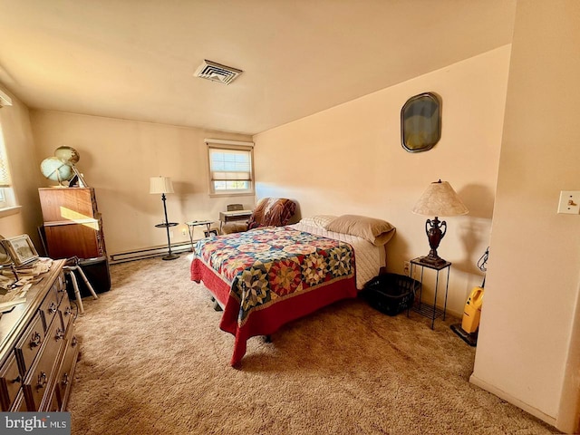 carpeted bedroom featuring a baseboard heating unit