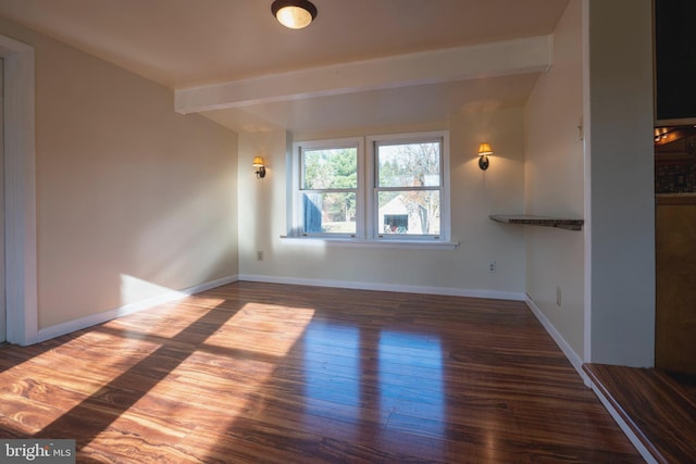 unfurnished living room featuring dark wood-type flooring