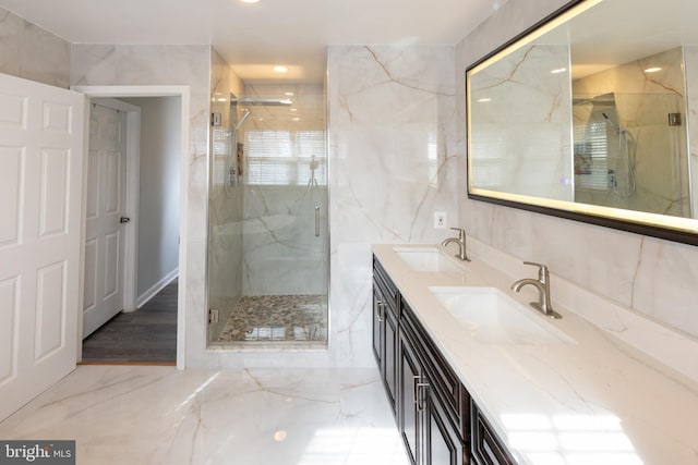 bathroom featuring vanity and walk in shower