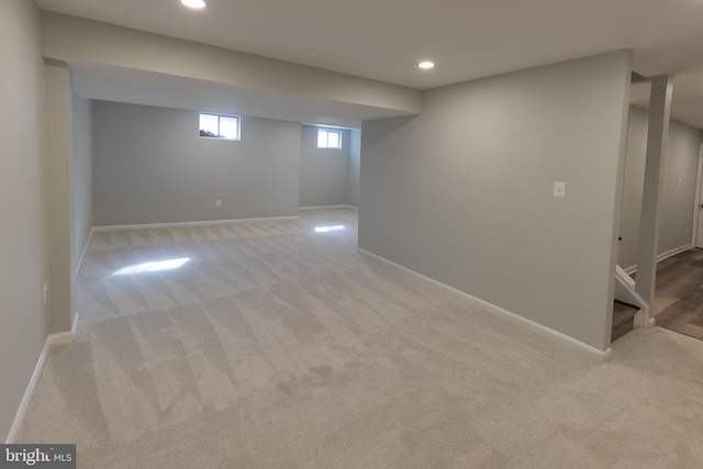 basement with light carpet