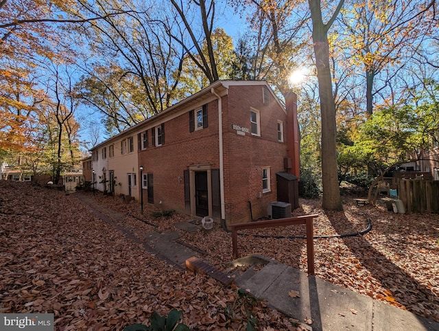 view of property exterior featuring central air condition unit