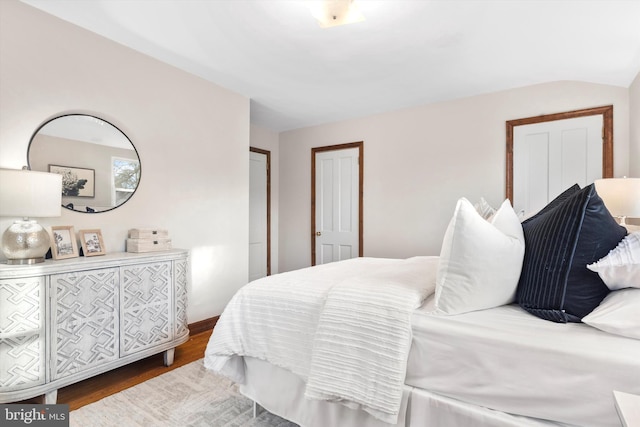 bedroom featuring dark hardwood / wood-style flooring