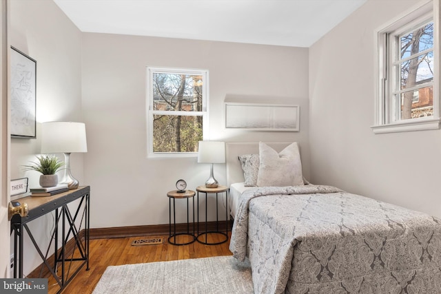 bedroom featuring hardwood / wood-style floors