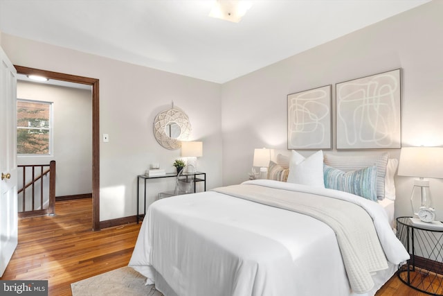 bedroom featuring hardwood / wood-style floors