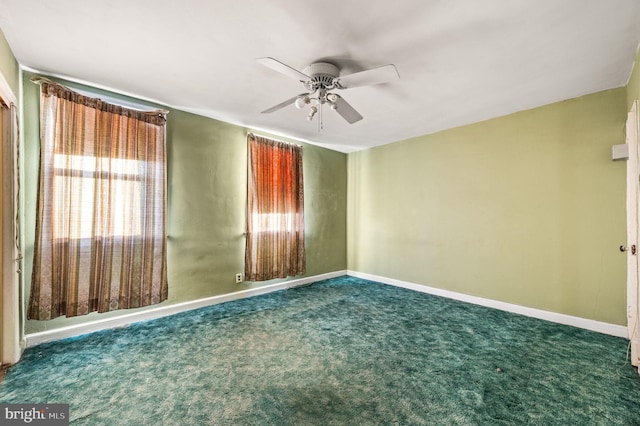 carpeted empty room with ceiling fan