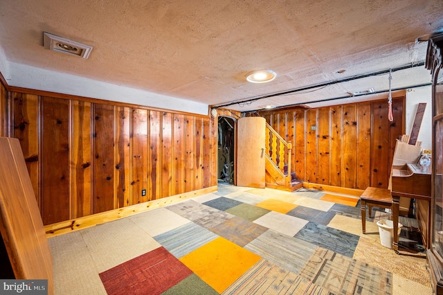 basement with wood walls