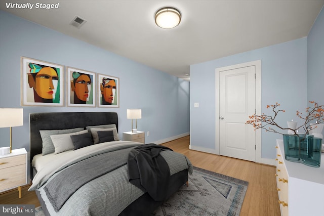 bedroom featuring hardwood / wood-style flooring