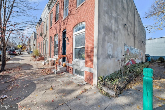 view of property exterior featuring a patio