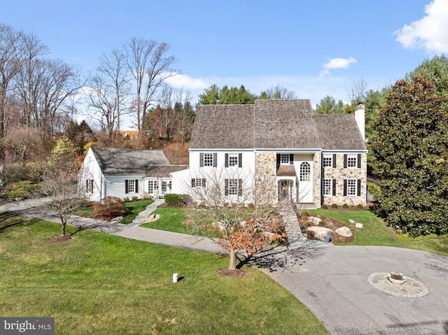 view of front of home with a front yard