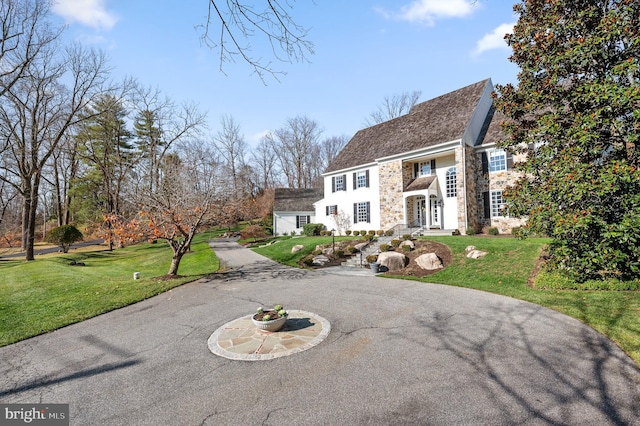 view of front of house with a front lawn