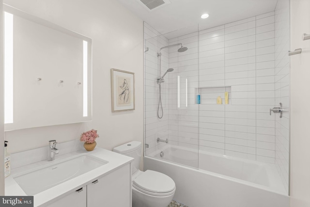 bathroom featuring visible vents, vanity, toilet, and tub / shower combination