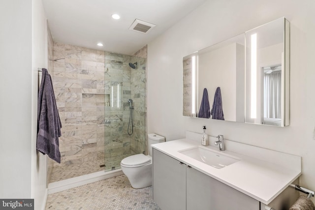 full bath with toilet, recessed lighting, vanity, visible vents, and walk in shower