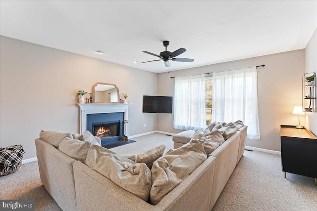 living room featuring ceiling fan and light carpet