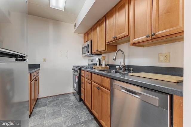 2630 Fort Farnsworth Rd Unit 149, Alexandria, VA 22303 - kitchen with stainless steel appliances, dark countertops, and brown cabinets
