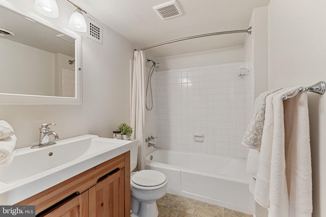 full bathroom with tile patterned flooring, vanity, shower / tub combo with curtain, and toilet