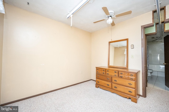 unfurnished bedroom with light carpet and ceiling fan