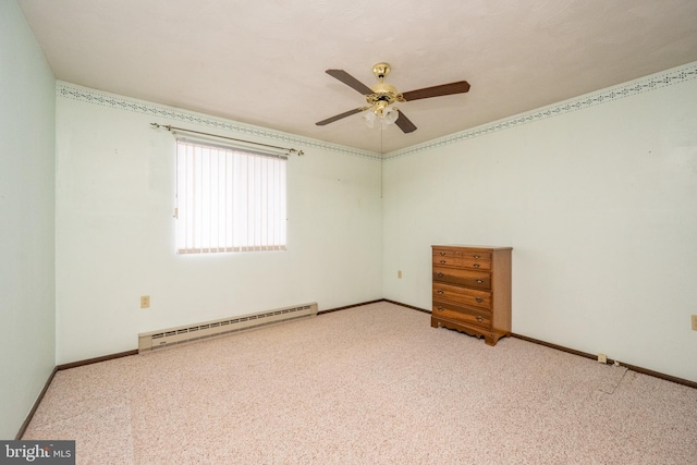 carpeted spare room featuring ceiling fan and a baseboard radiator