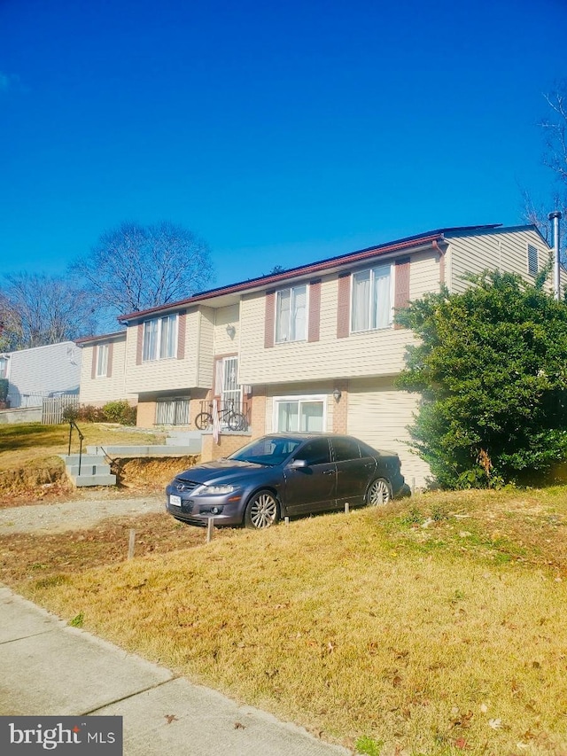 view of front of home with a front yard