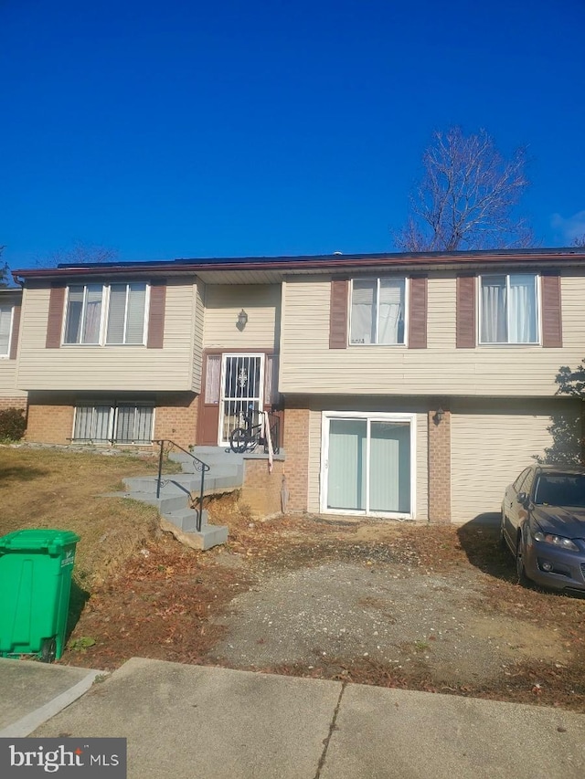 3608 Kidder Rd, Clinton, MD 20735 - bi-level home featuring brick siding and an attached garage
