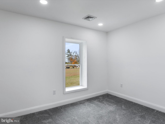 unfurnished room featuring carpet flooring