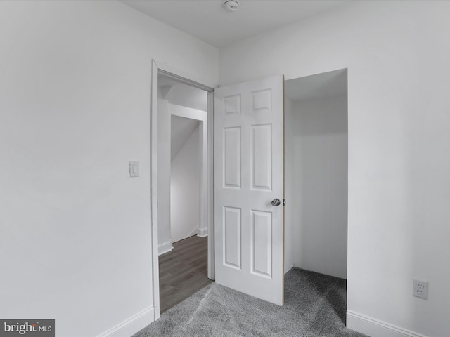 unfurnished bedroom featuring hardwood / wood-style floors