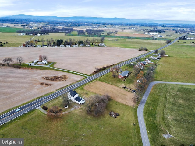 bird's eye view with a mountain view and a rural view