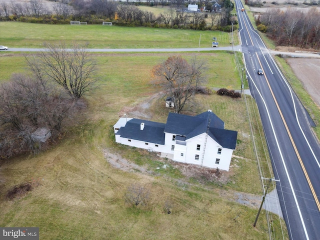 birds eye view of property featuring a rural view