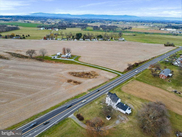 bird's eye view with a mountain view and a rural view