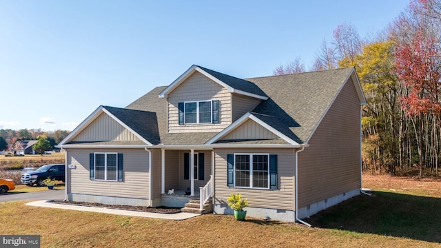 view of front of property featuring a front yard