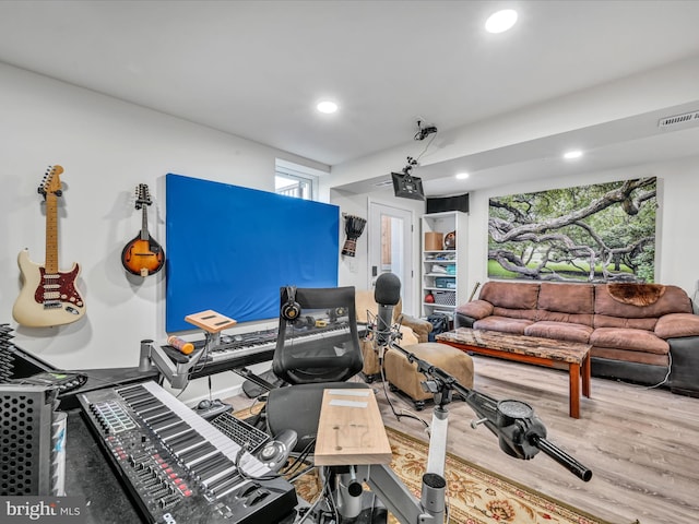 interior space with hardwood / wood-style floors and a healthy amount of sunlight