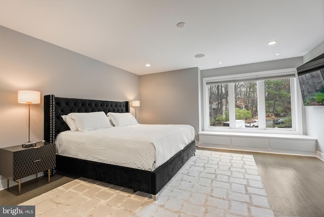 bedroom featuring hardwood / wood-style floors