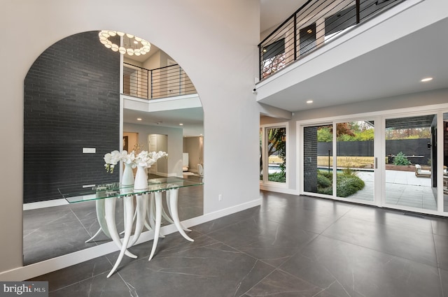 interior space with a towering ceiling