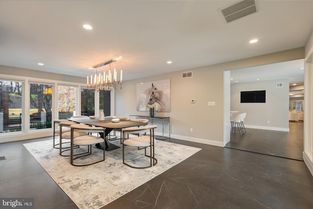 dining room with a chandelier