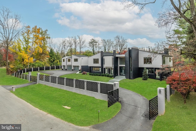 view of front of property with a front lawn