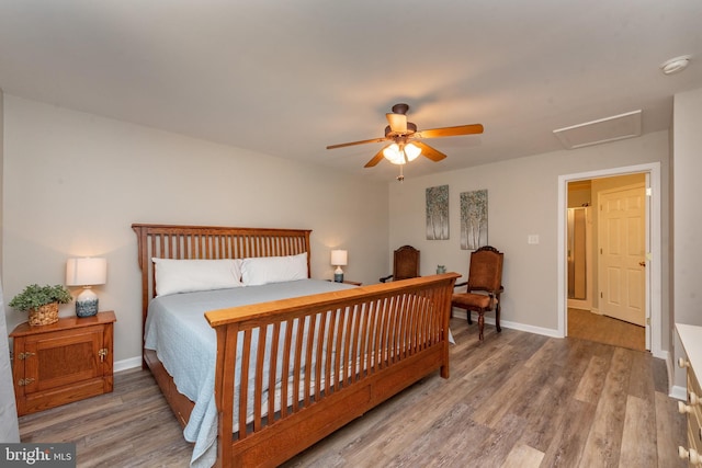 bedroom featuring hardwood / wood-style floors and ceiling fan