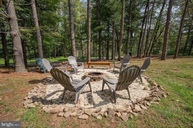 view of patio with a fire pit