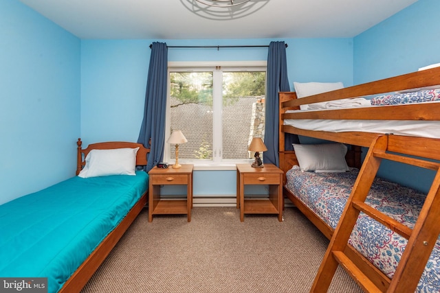 bedroom with multiple windows and carpet floors