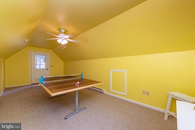 playroom featuring carpet flooring, ceiling fan, and vaulted ceiling