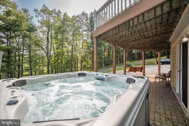 view of patio / terrace featuring a hot tub