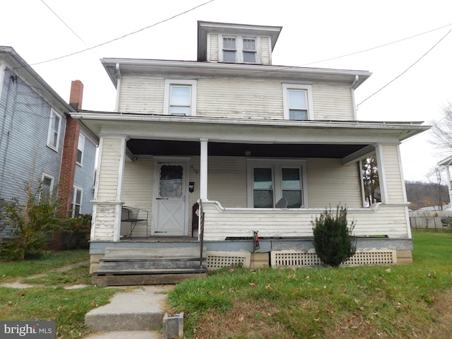 view of front of property featuring covered porch