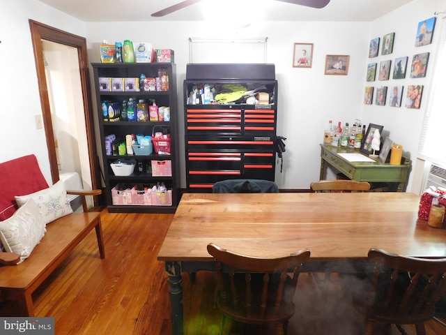 interior space featuring hardwood / wood-style flooring, ceiling fan, and beverage cooler