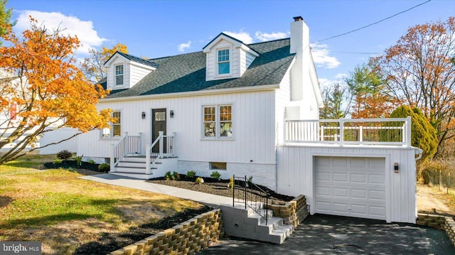 cape cod house with a balcony