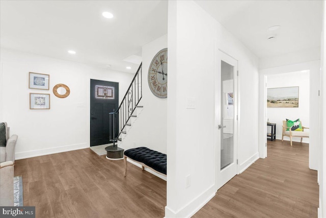 foyer entrance with wood-type flooring