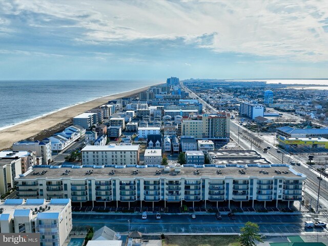 drone / aerial view with a view of the beach and a water view