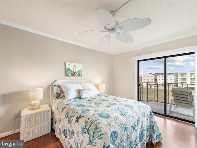 bedroom with a textured ceiling, access to outside, ceiling fan, crown molding, and dark wood-type flooring