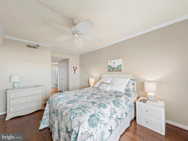 bedroom with ceiling fan, crown molding, and dark hardwood / wood-style floors