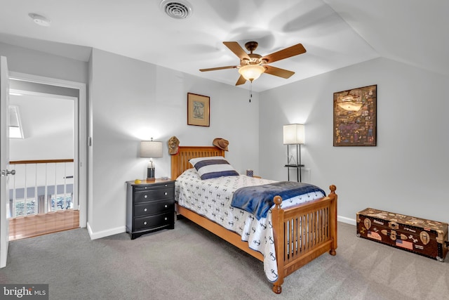 bedroom with carpet, ceiling fan, and lofted ceiling